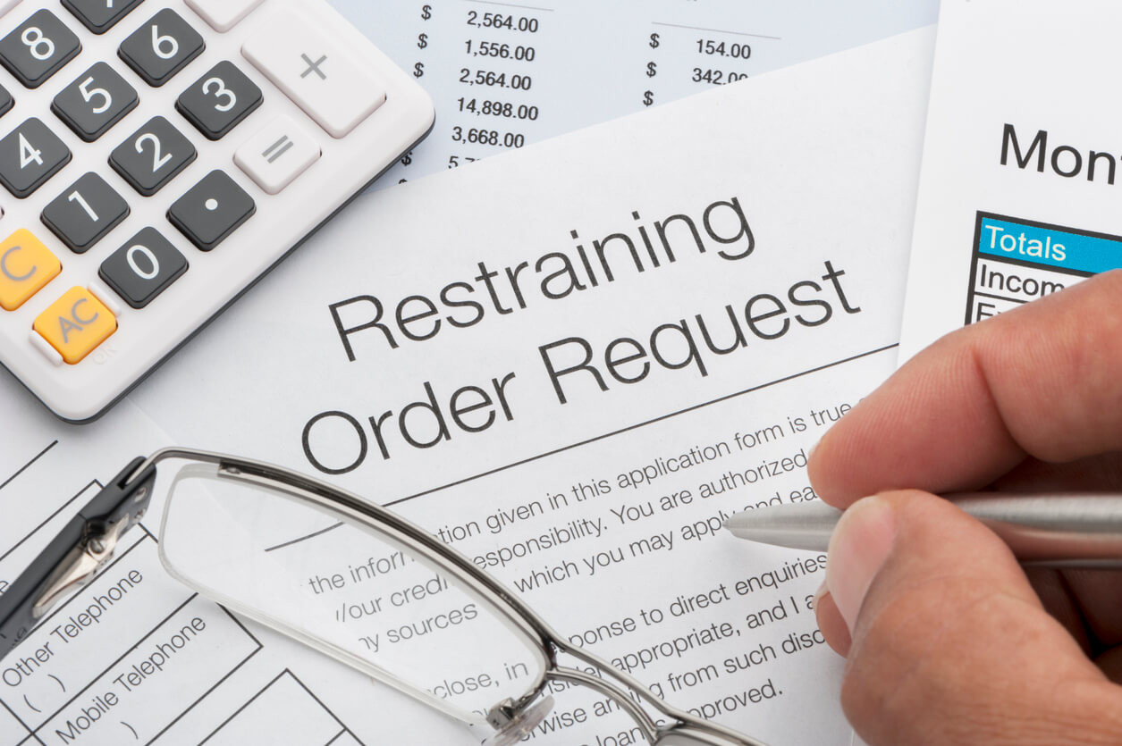 Can a business get a restraining order against a customer